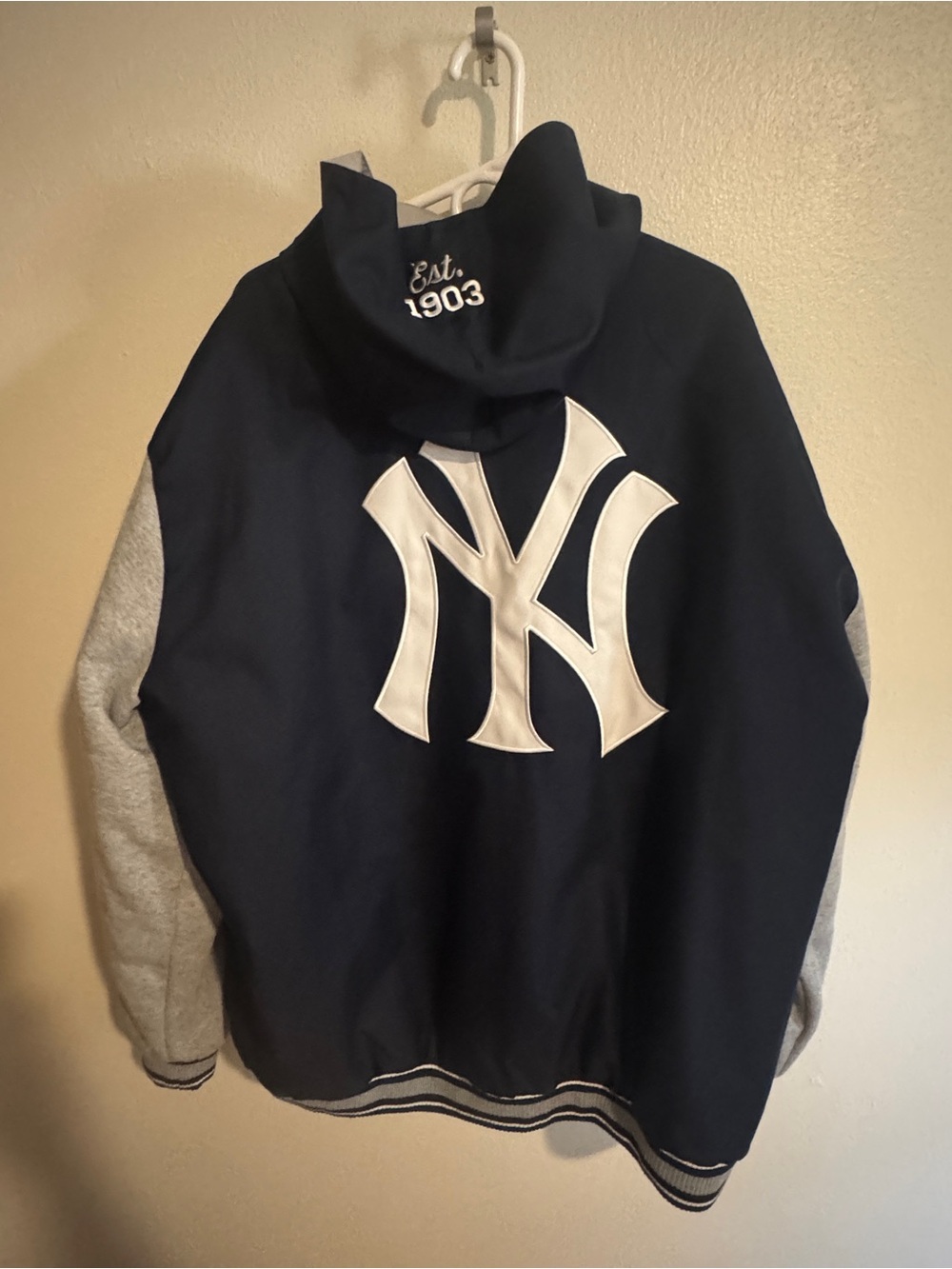 Genuine Merchandise Navy and Gray Jacket with Red Logo